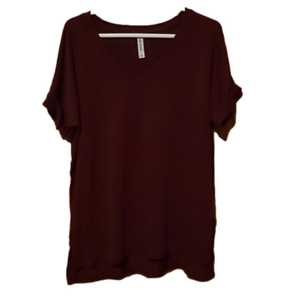 V neck knit top. Burgundy in color. Oversized S. Short sleeves.